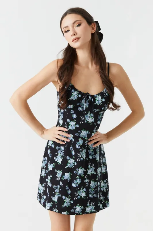 Blue Floral Print Crepe Knit Cami Milkmaid Mini Dress sold by Charlotte Russe