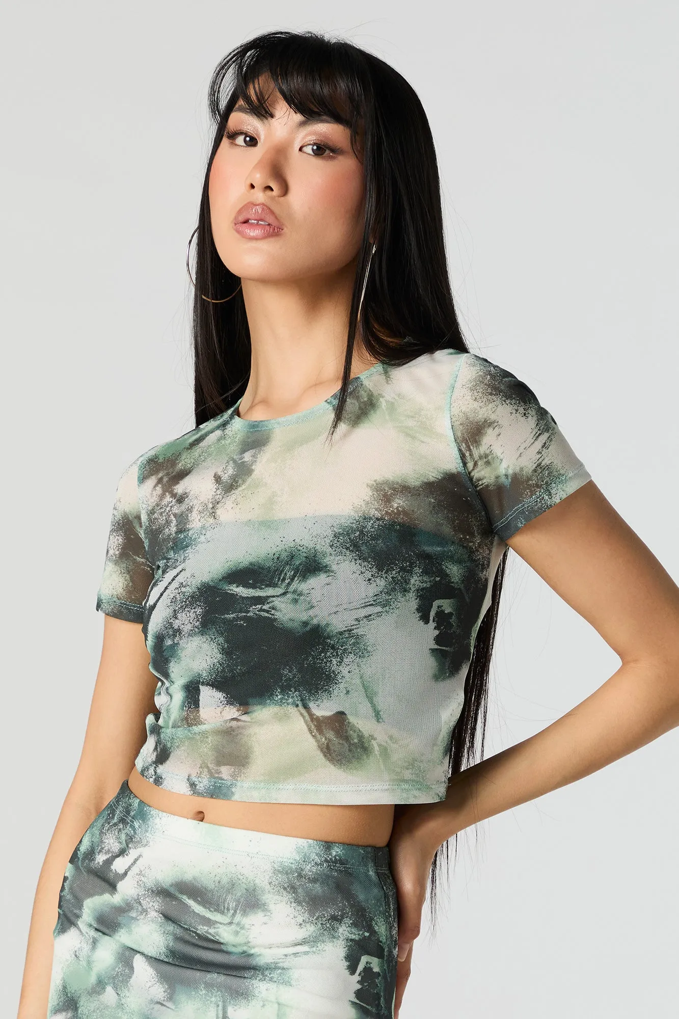 Green Abstract Mesh Cropped T-Shirt sold by Charlotte Russe