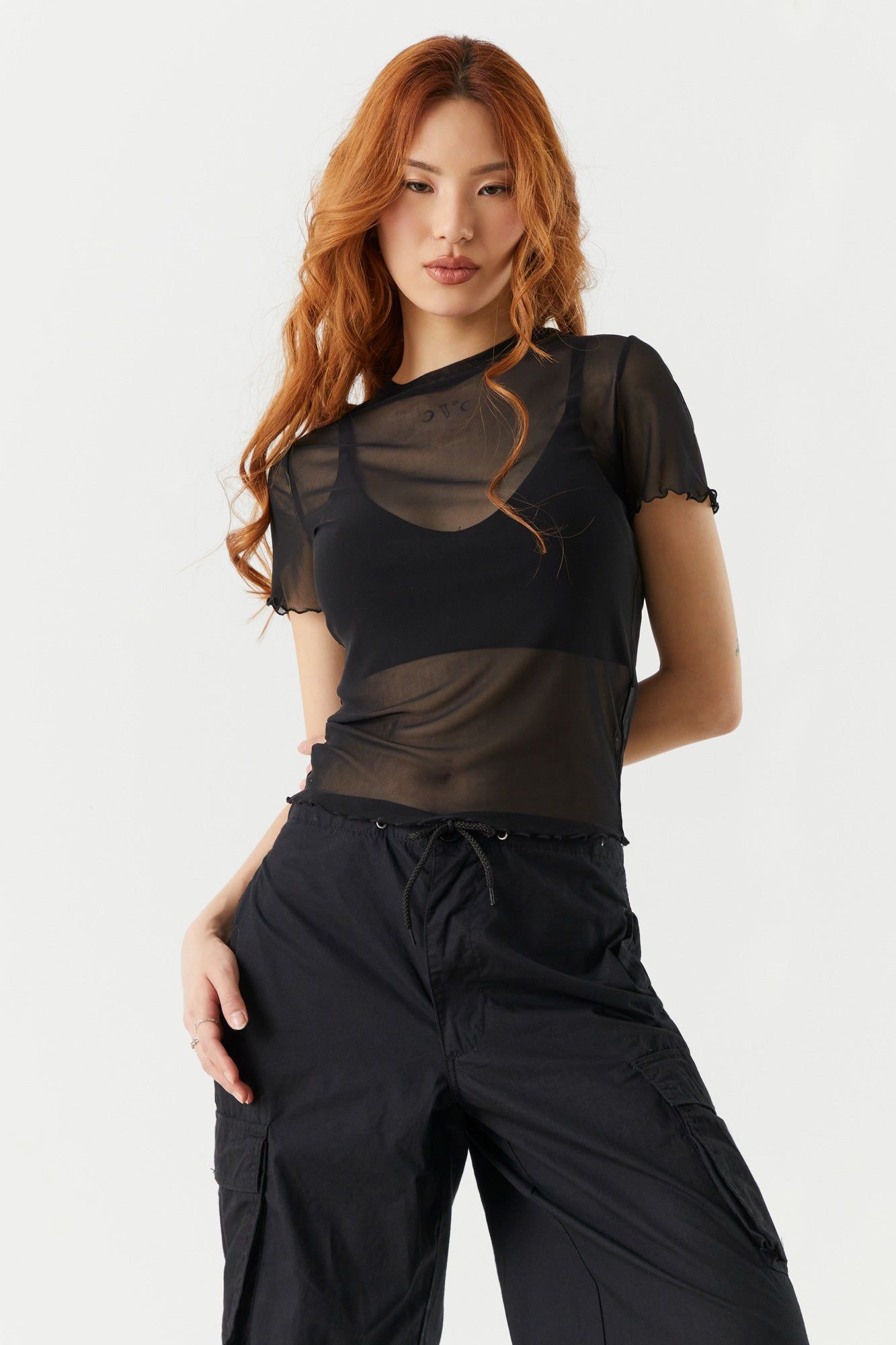 Mesh Ruffle T-Shirt sold by Charlotte Russe