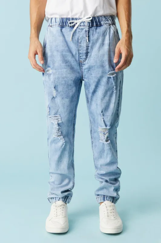 Distressed Light Wash Straight Leg Denim Jogger sold by Charlotte Russe