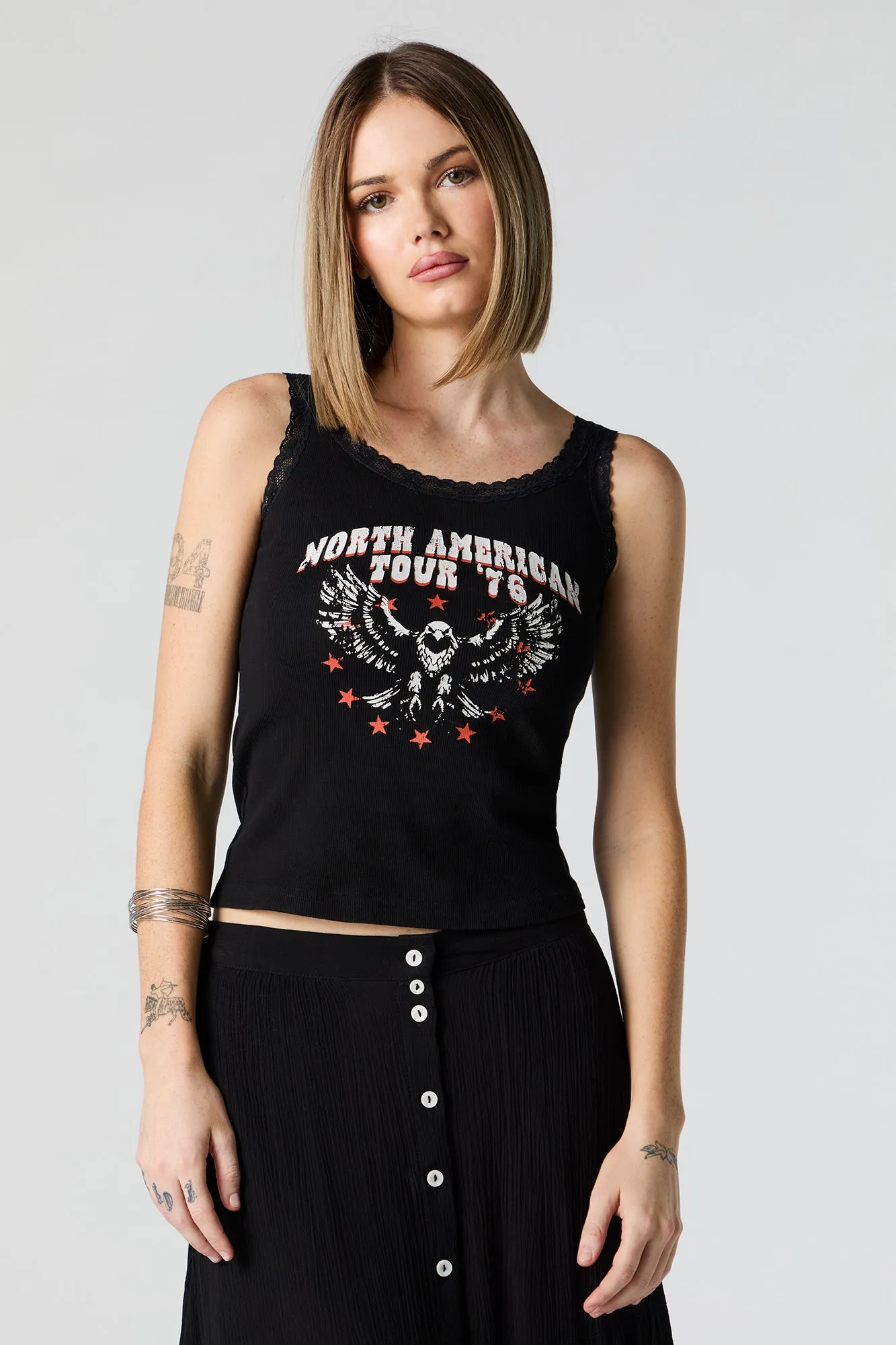 North American Tour Graphic Lace Trim Tank sold by Charlotte Russe