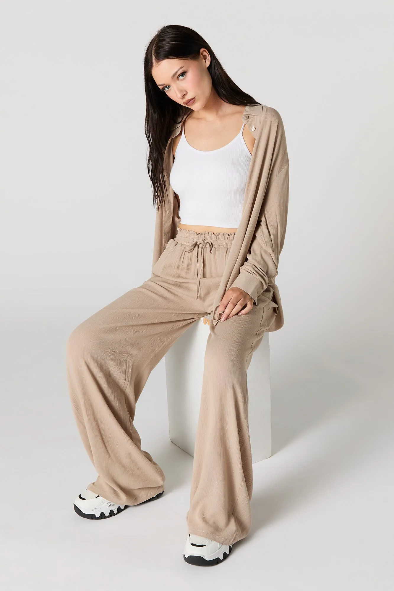 Textured Drawstring Flowy Pant sold by Charlotte Russe