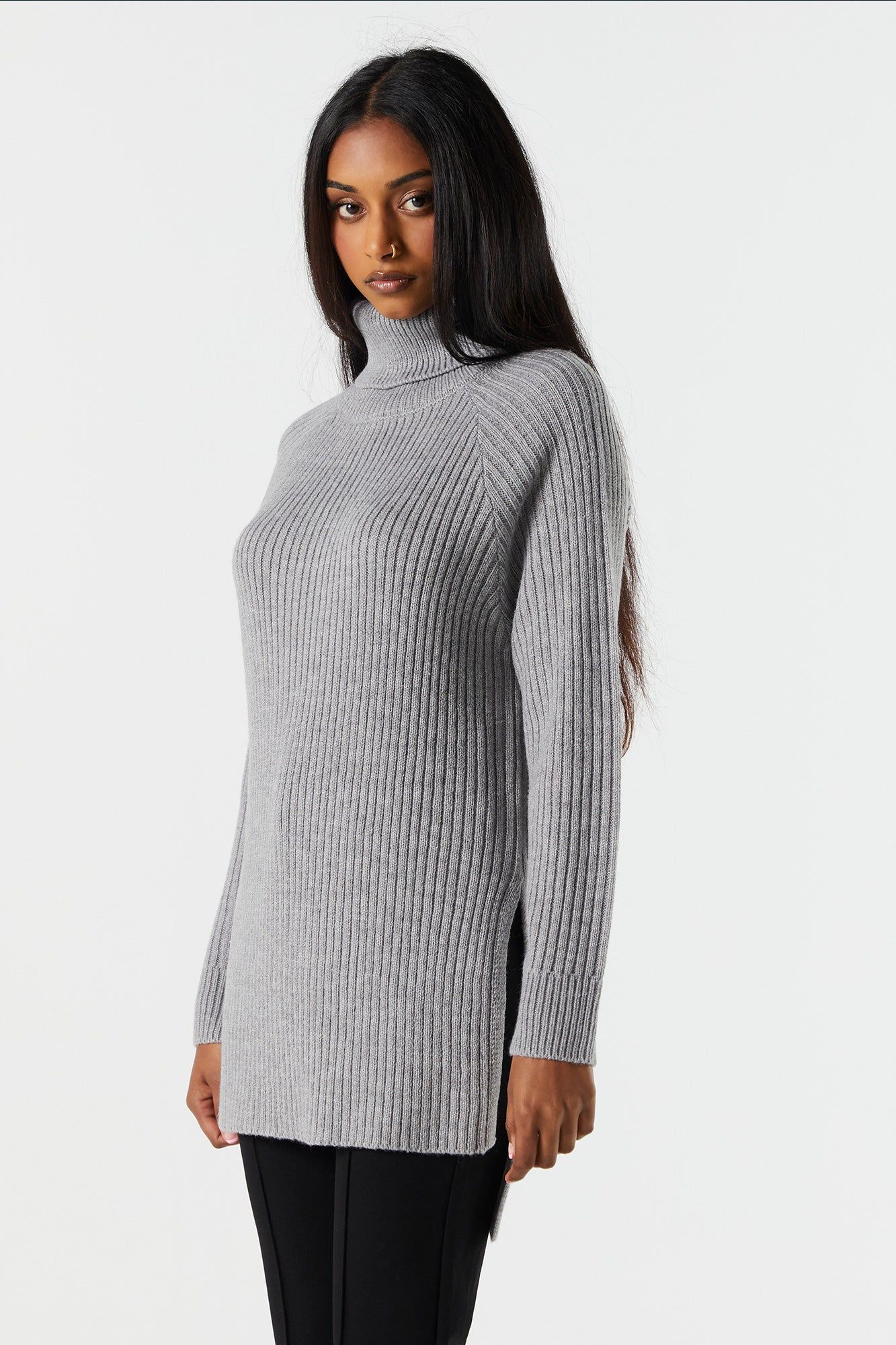 Ribbed Knit Turtleneck Tunic sold by Charlotte Russe
