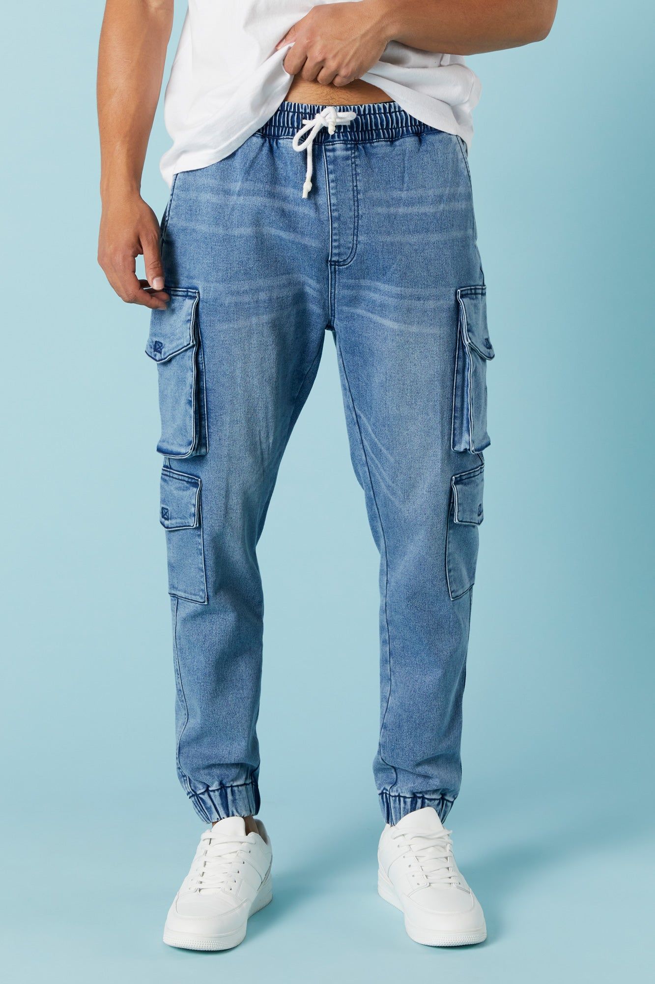 Black Wash Denim Cargo Jogger sold by Charlotte Russe