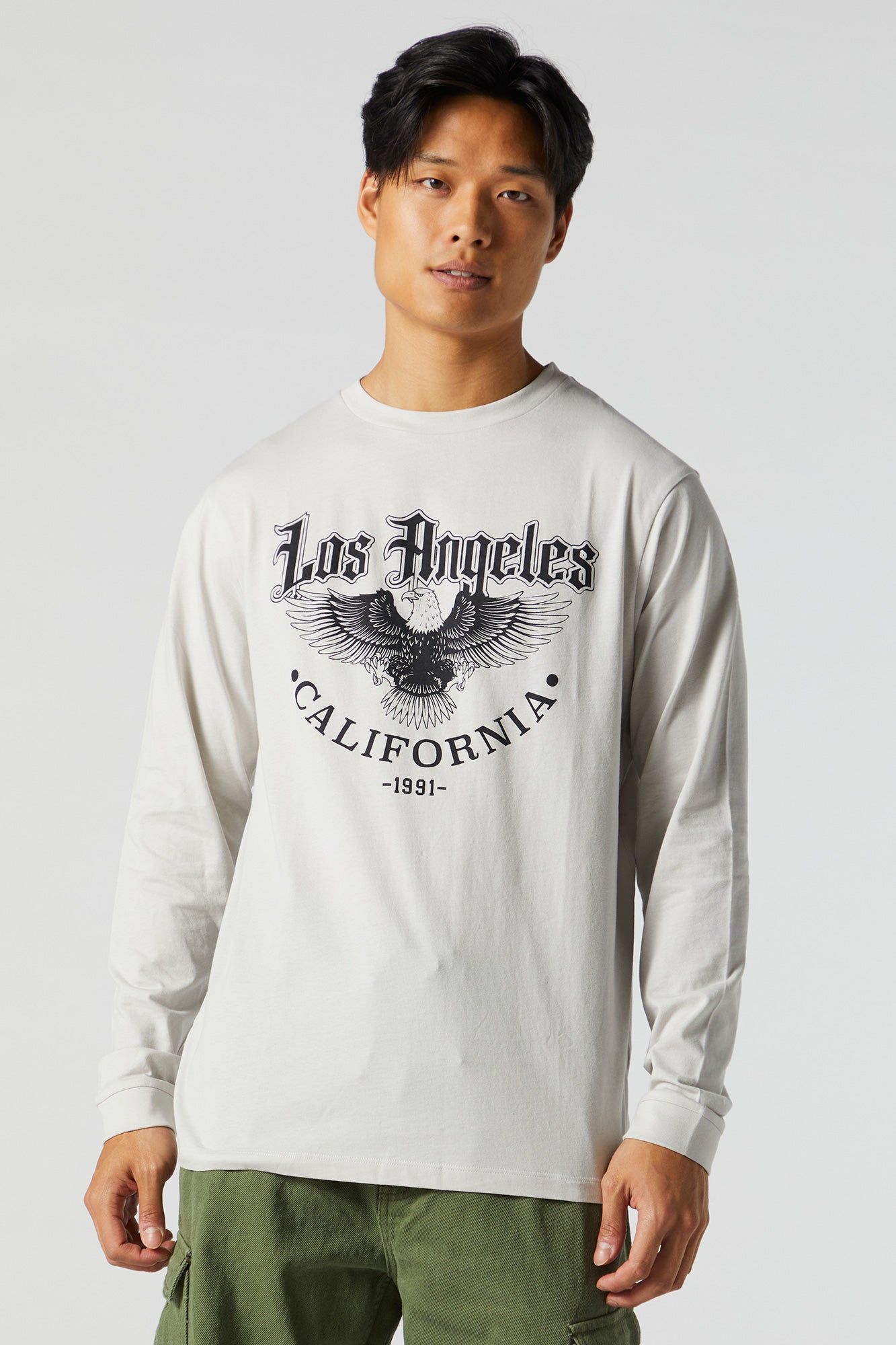 Los Angeles Graphic Long Sleeve Top sold by Charlotte Russe