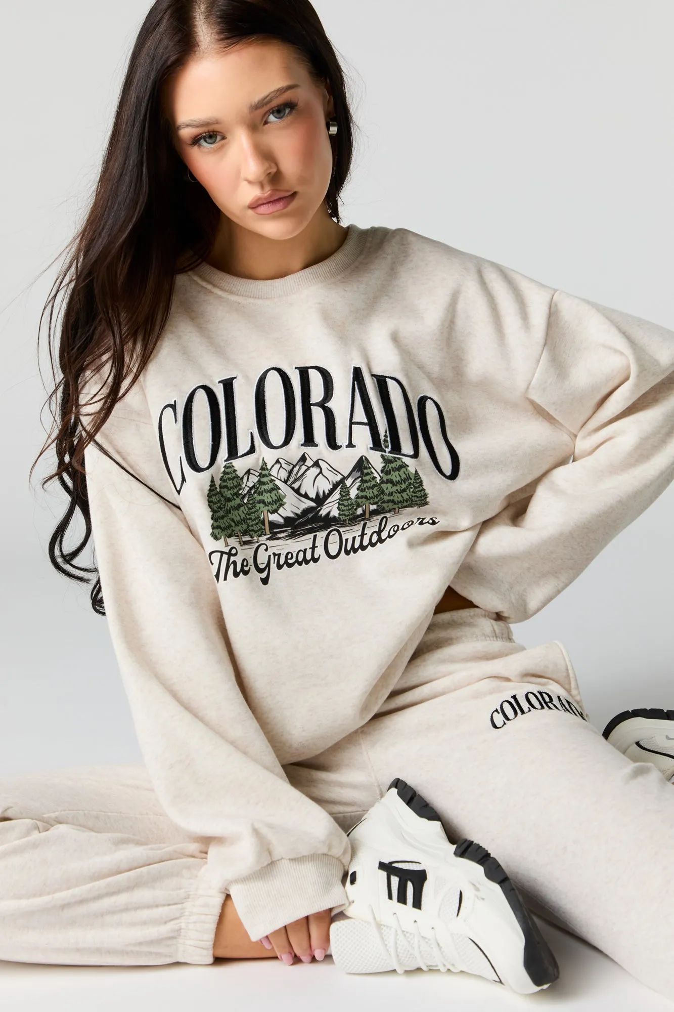 Oversized Destination Embroidered Fleece Sweatshirt sold by Charlotte Russe