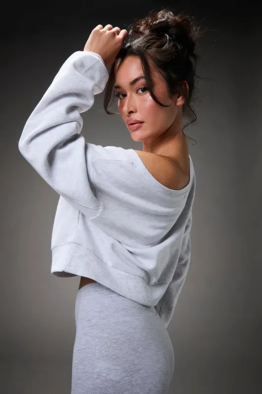 Soft Fleece Off Shoulder Cropped Sweatshirt sold by Charlotte Russe