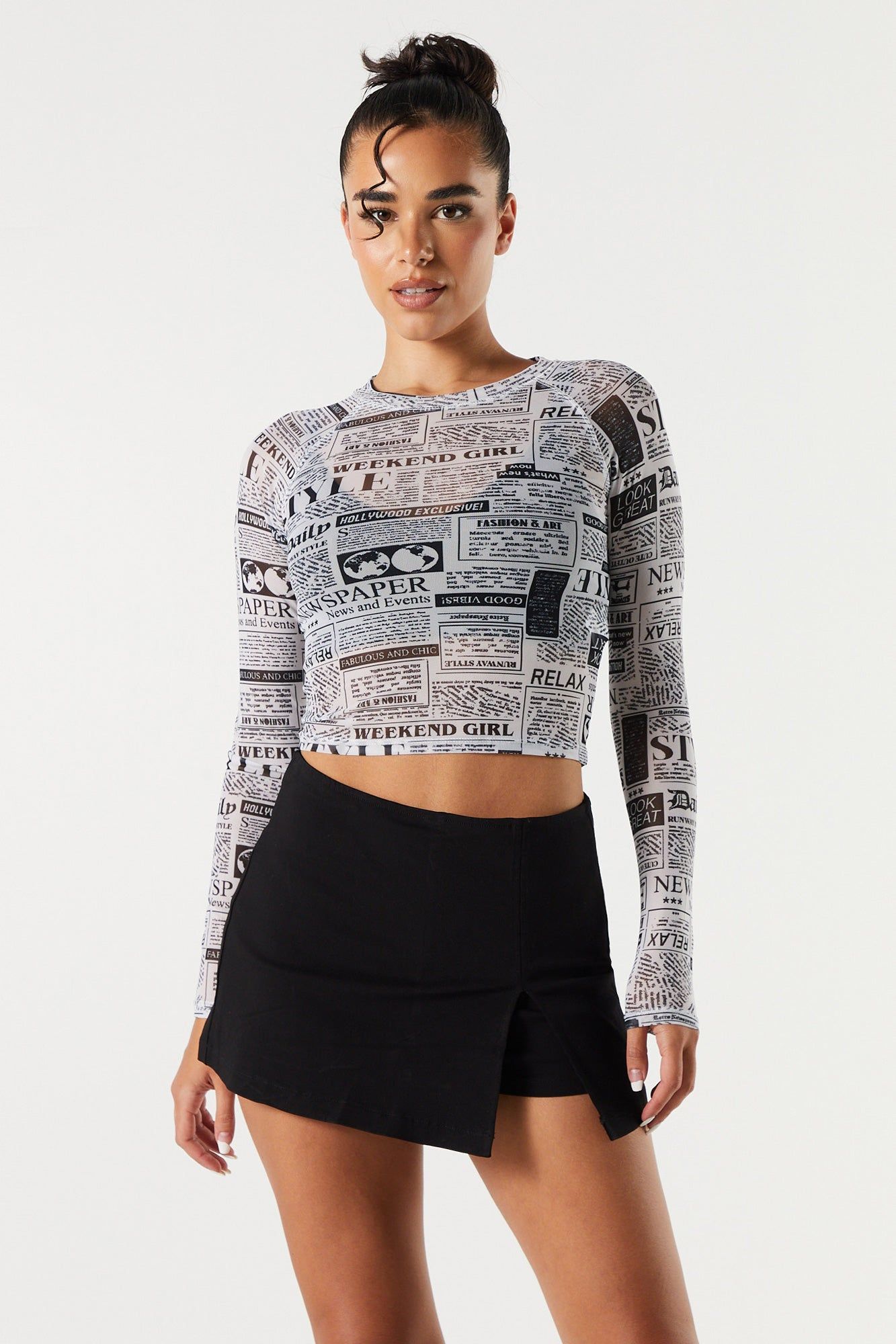 Newspaper Print Mesh Long Sleeve Crop Top sold by Charlotte Russe