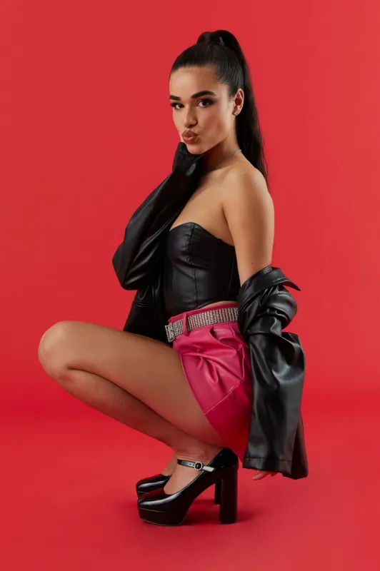 Faux-Leather Pleated Mom Short sold by Charlotte Russe