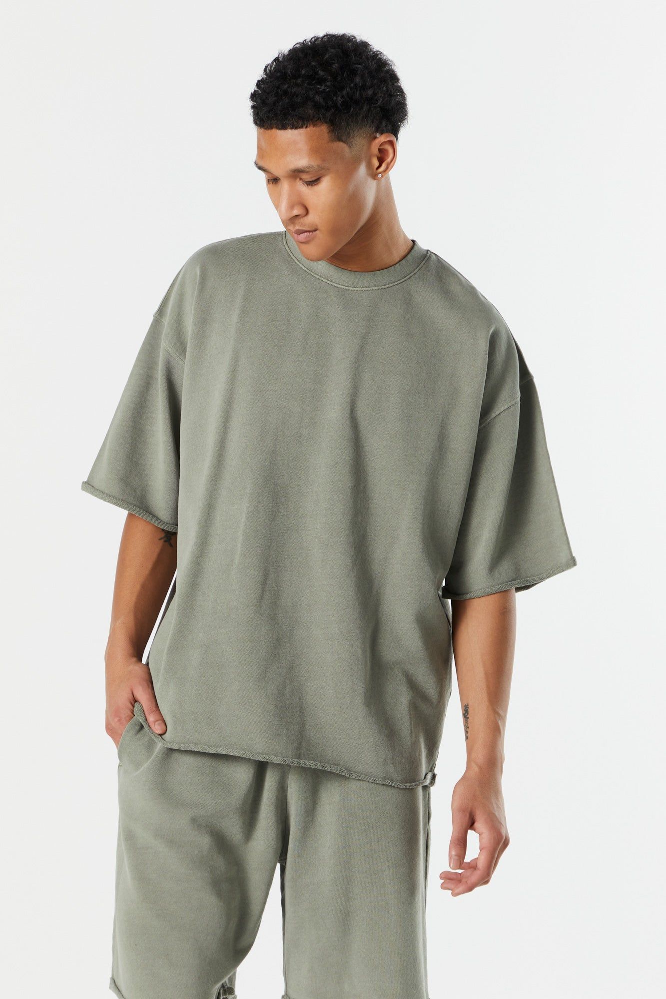 Oversized Rolled Hem Crewneck T-Shirt sold by Charlotte Russe