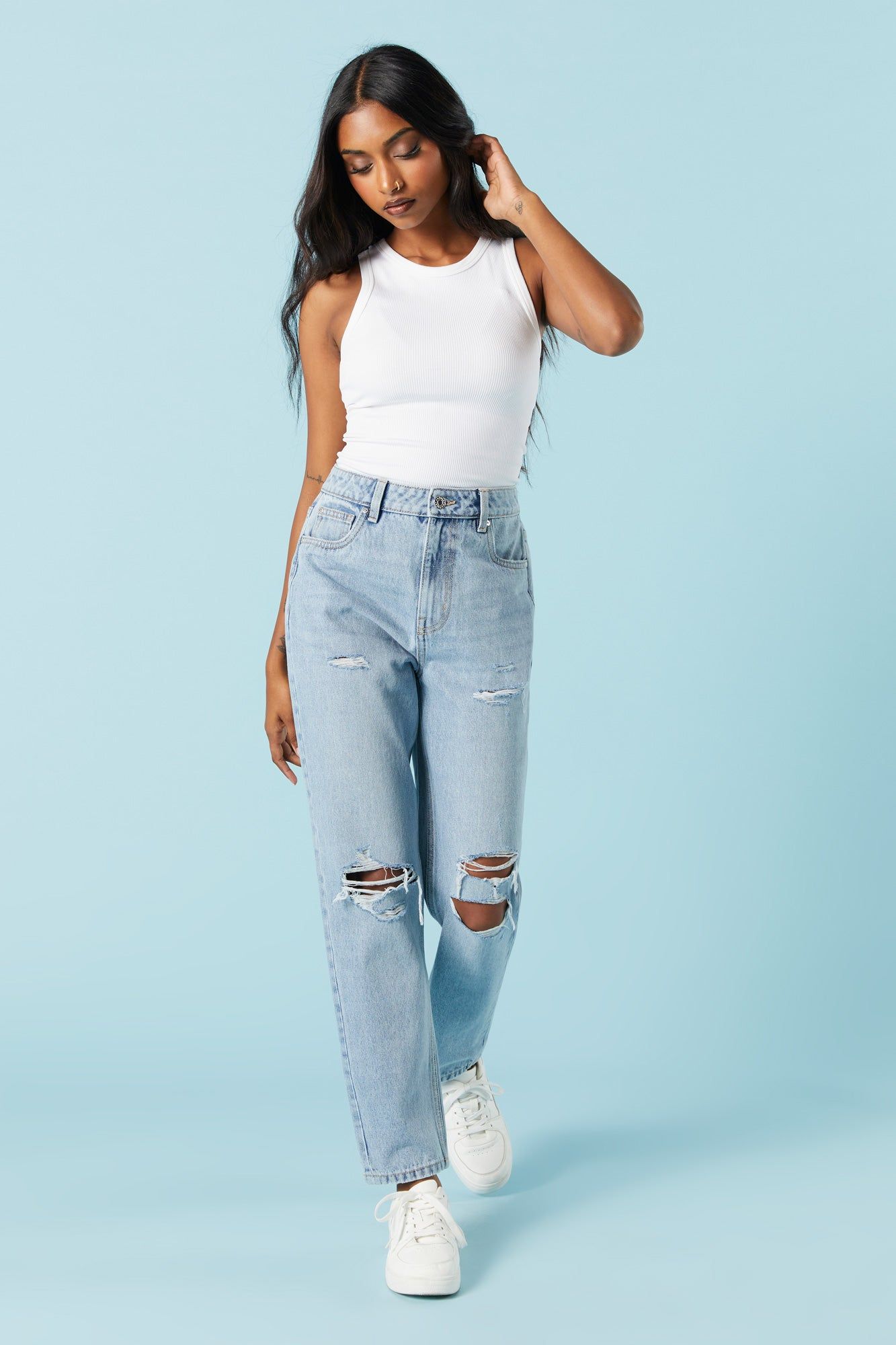 Light Wash Distressed Mom Jean sold by Charlotte Russe