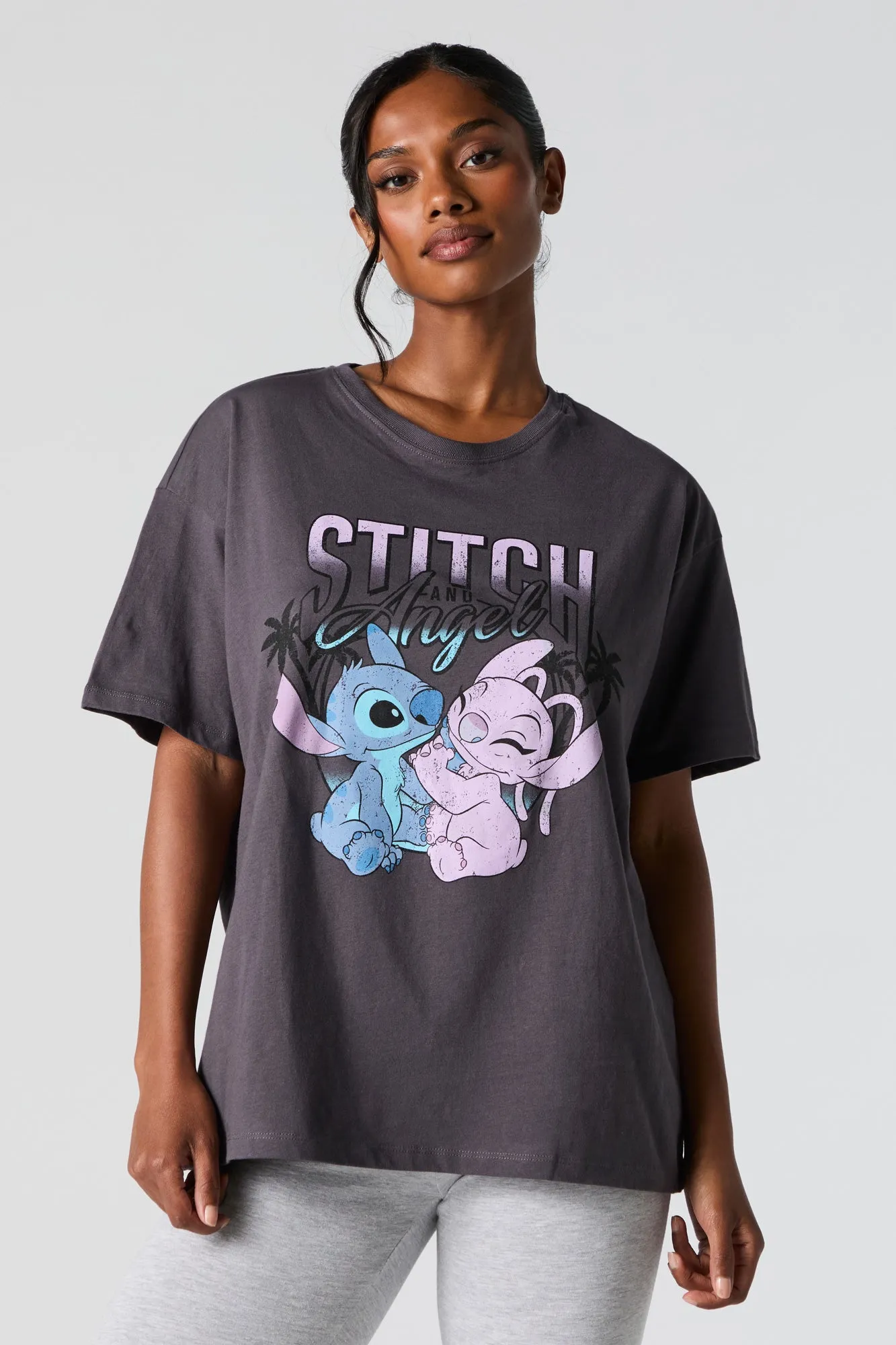 Stitch and Angel Graphic Boyfriend T-Shirt sold by Charlotte Russe