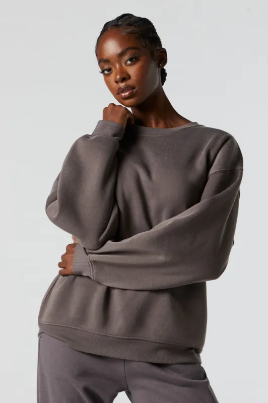 Oversized Fleece Crewneck Sweatshirt sold by Charlotte Russe