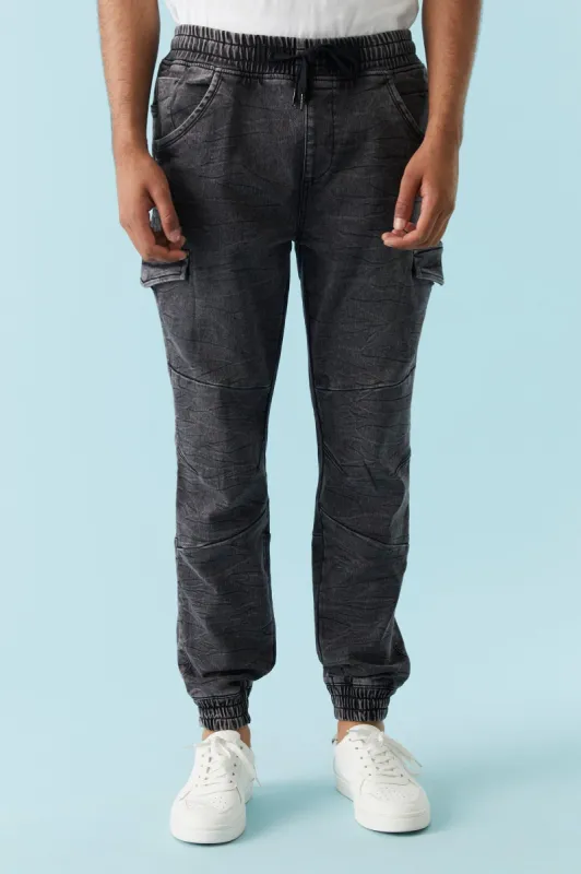 Black Wash Denim Knit Cargo Jogger sold by Charlotte Russe