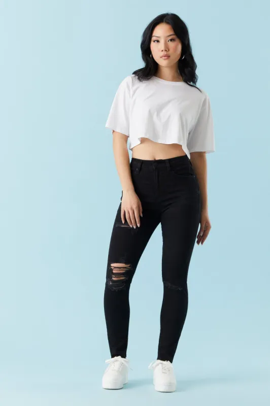 Refuge High-Rise Black Wash Distressed Skinny Jean sold by Charlotte Russe