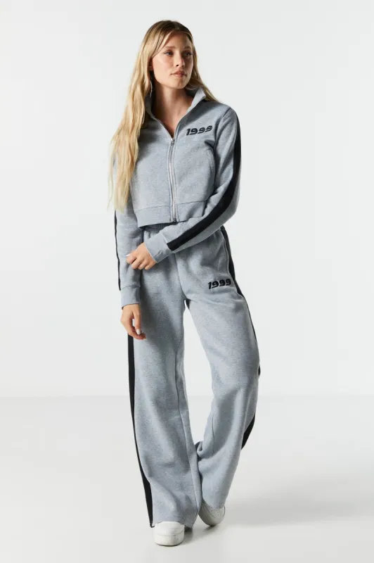 1999 Embroidered Fleece Wide Leg Track Pant sold by Charlotte Russe