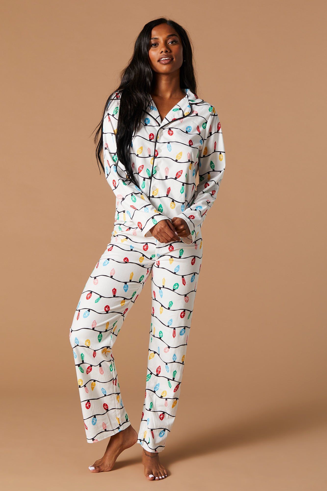 Matching the Family Holiday Lights Flannel 2 Piece Pajama Set sold by Charlotte Russe