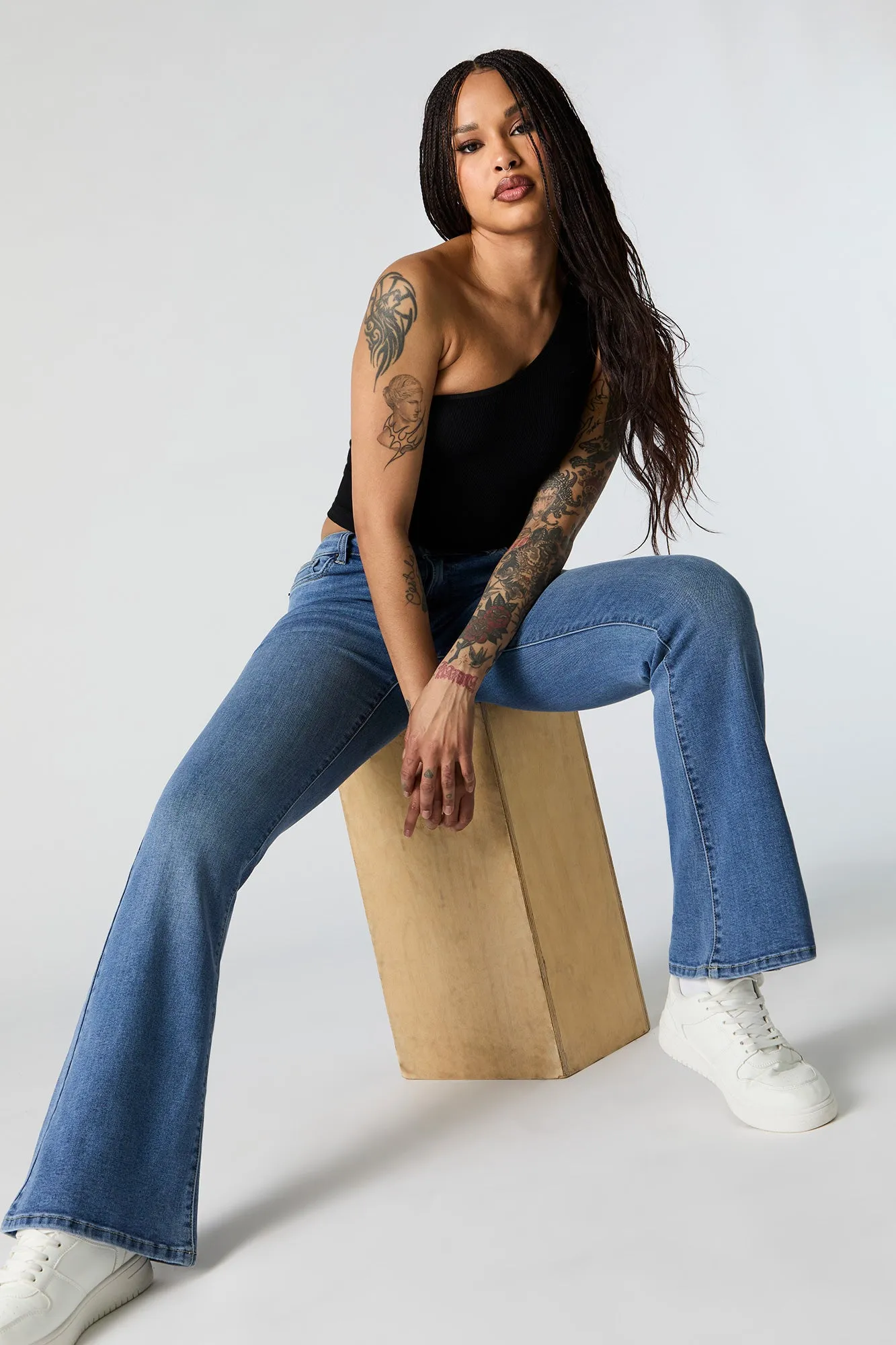 Austin Medium Wash Low Rise Flare Jean sold by Charlotte Russe