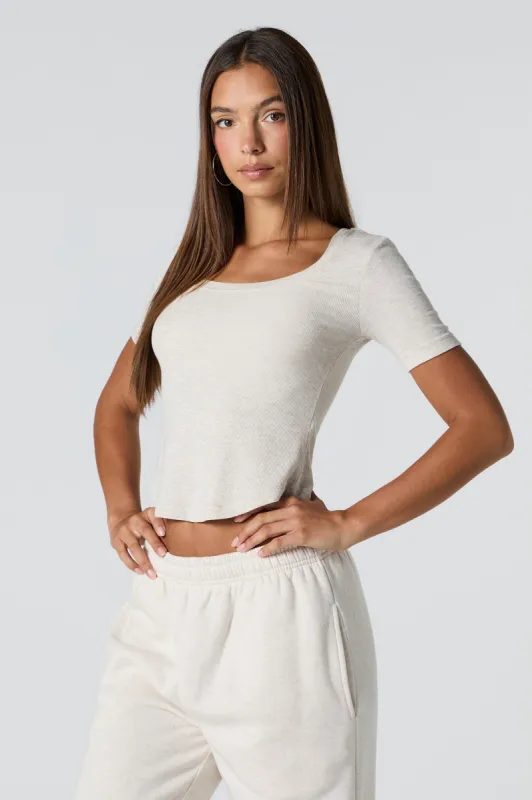 Ribbed Curved Hem T-Shirt sold by Charlotte Russe