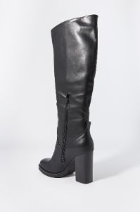 Faux Leather Knee High Heeled Boot sold by Charlotte Russe