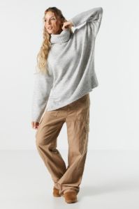 Knit Turtleneck Tunic sold by Charlotte Russe
