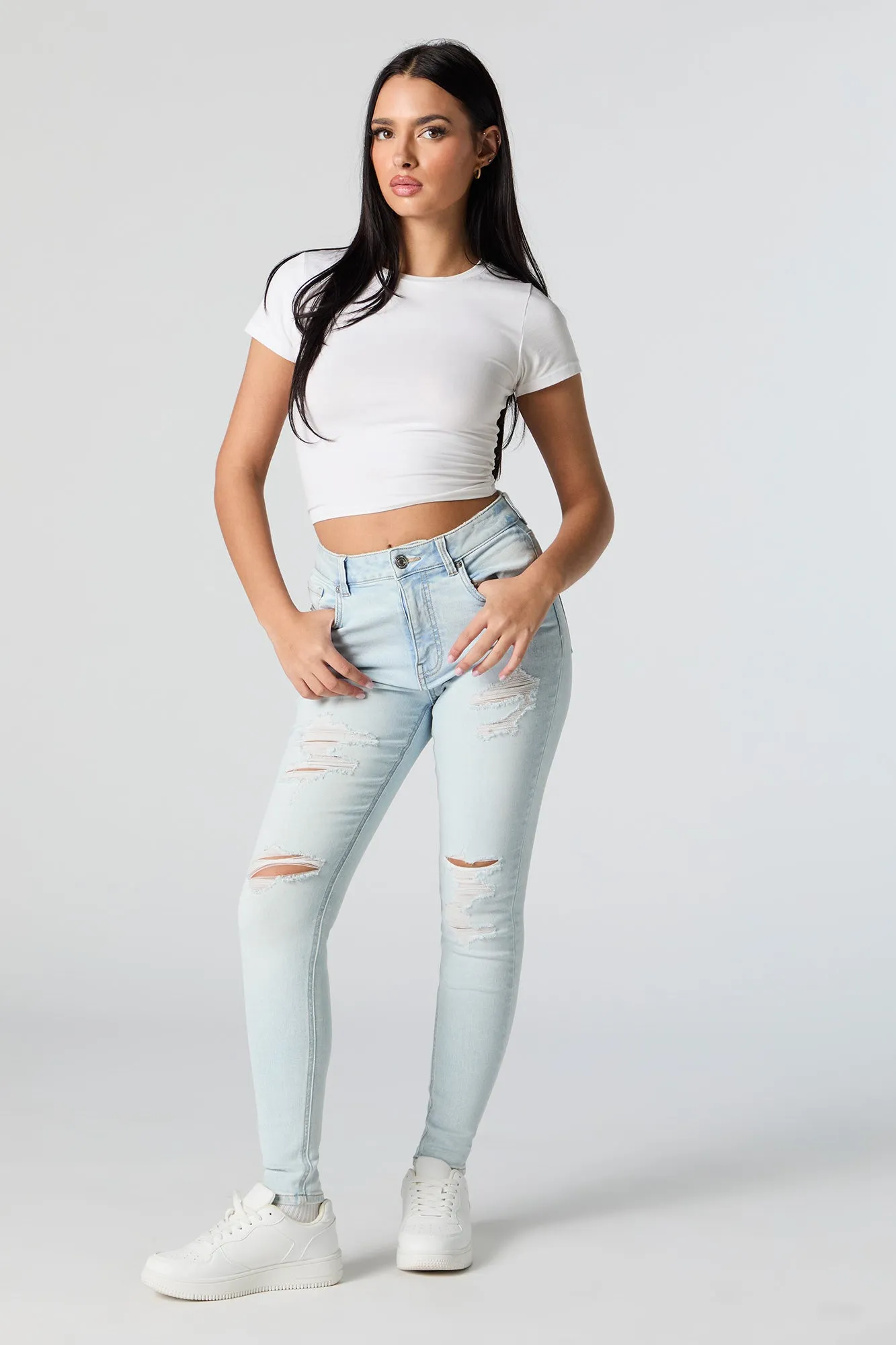 Miami Light Wash High Rise Distressed Skinny Jean sold by Charlotte Russe