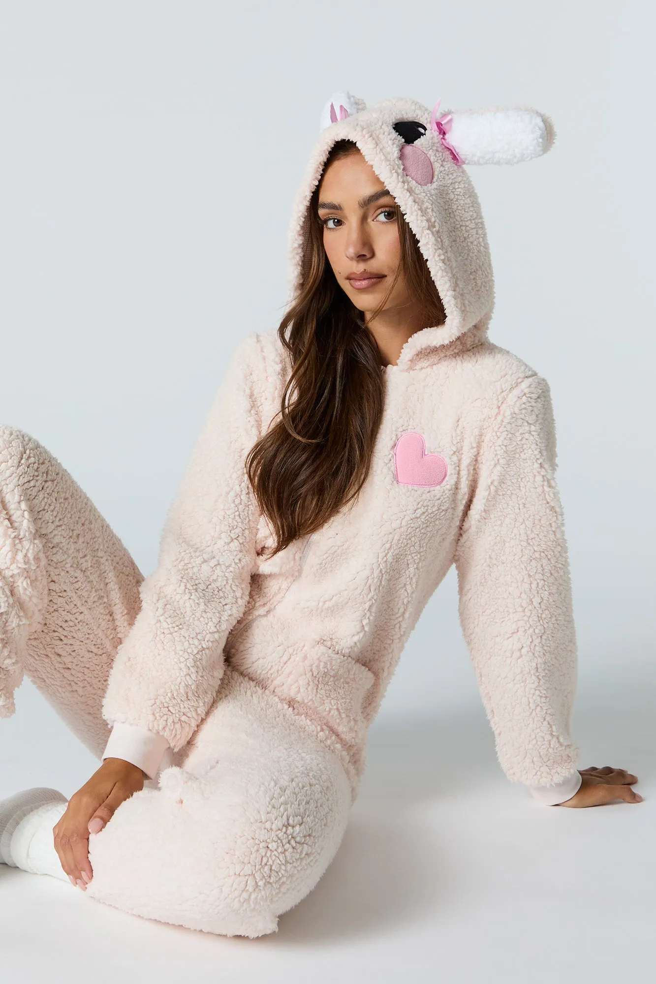 3D Bunny Sherpa Onesie sold by Charlotte Russe