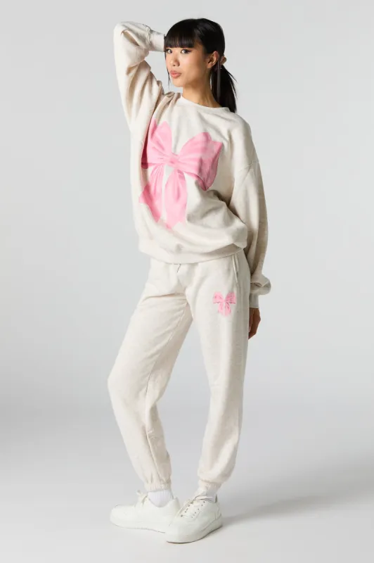 Cutesy Graphic Fleece Jogger sold by Charlotte Russe