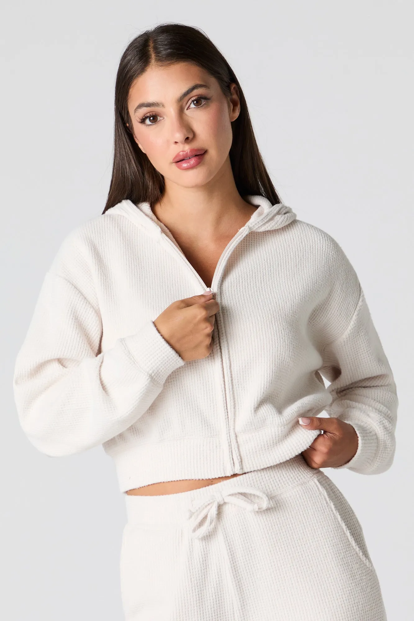 Waffle Knit Cropped Zip-Up Hoodie sold by Charlotte Russe