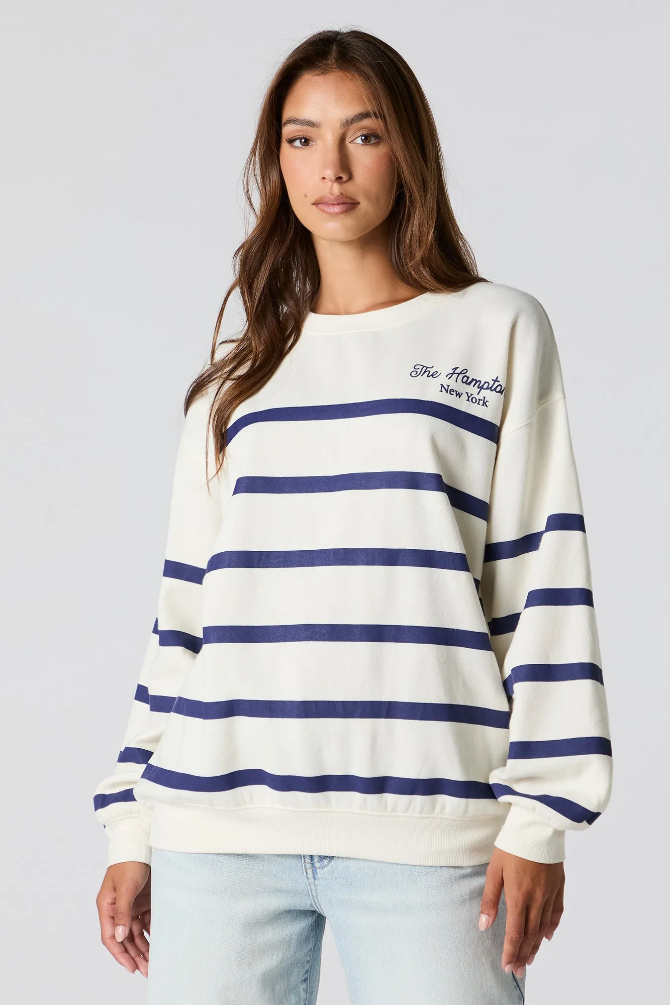 The Hamptons Graphic Striped Fleece Sweatshirt sold by Charlotte Russe