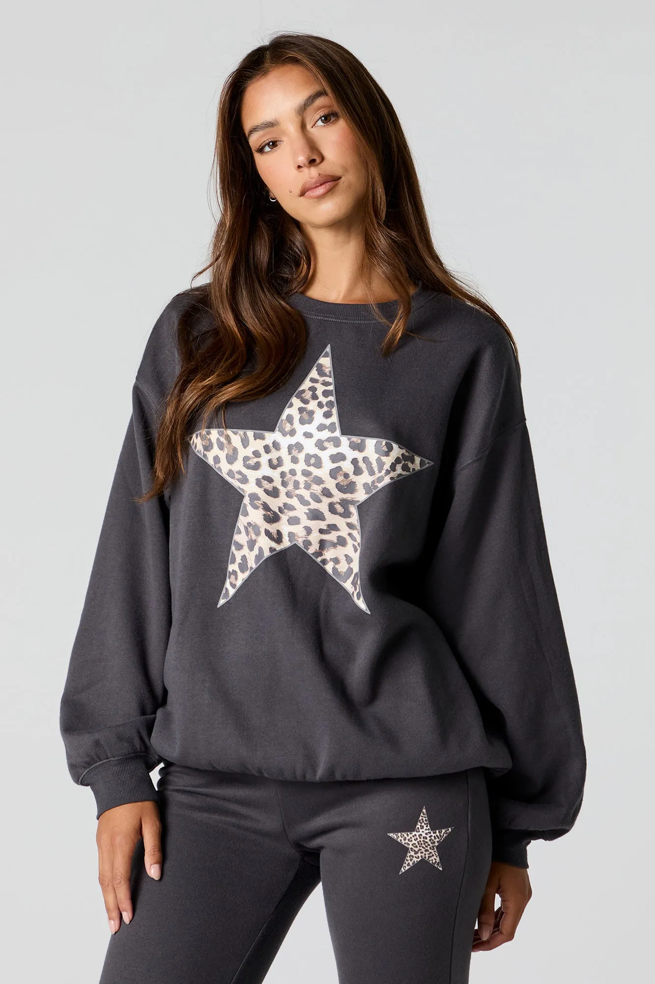 Graphic Fleece Sweatshirt sold by Charlotte Russe