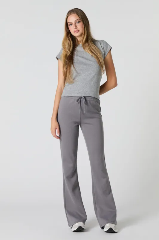Fleece Drawstring Flare Sweatpant sold by Charlotte Russe