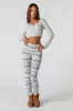 Christmas Print Soft Fleece Legging sold by Charlotte Russe