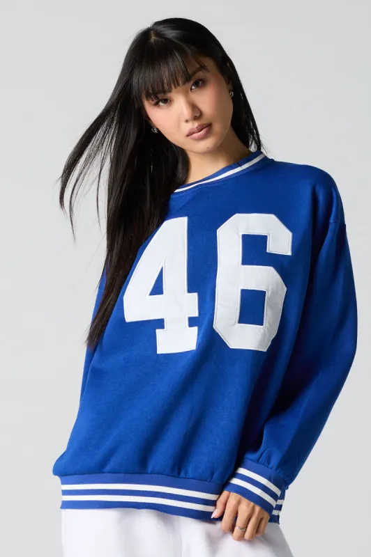 Embroidered Striped Trim Fleece Sweatshirt sold by Charlotte Russe