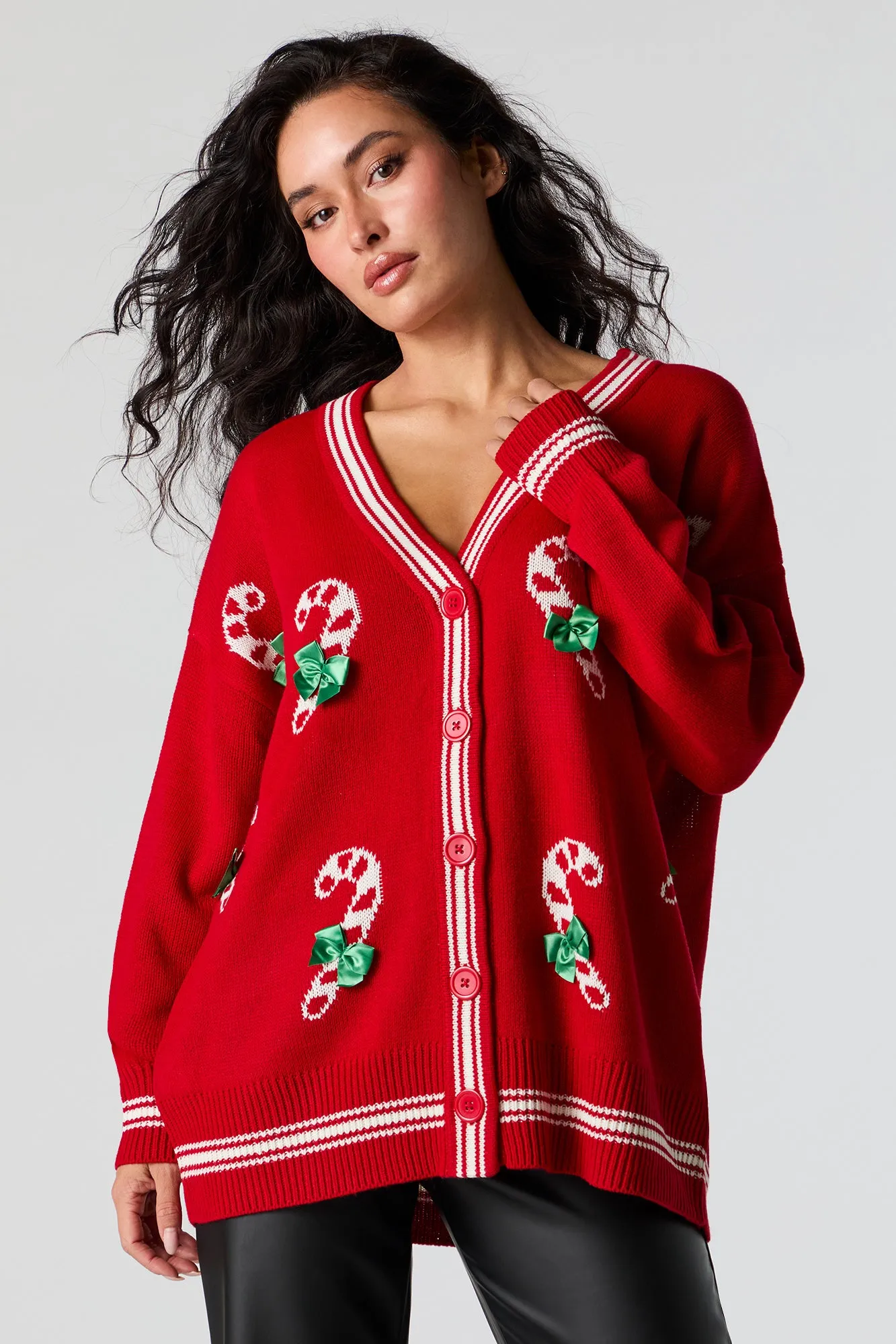Candy Cane Jacquard Knit Christmas Cardigan sold by Charlotte Russe