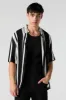Black and White Print Button-Up Top sold by Charlotte Russe