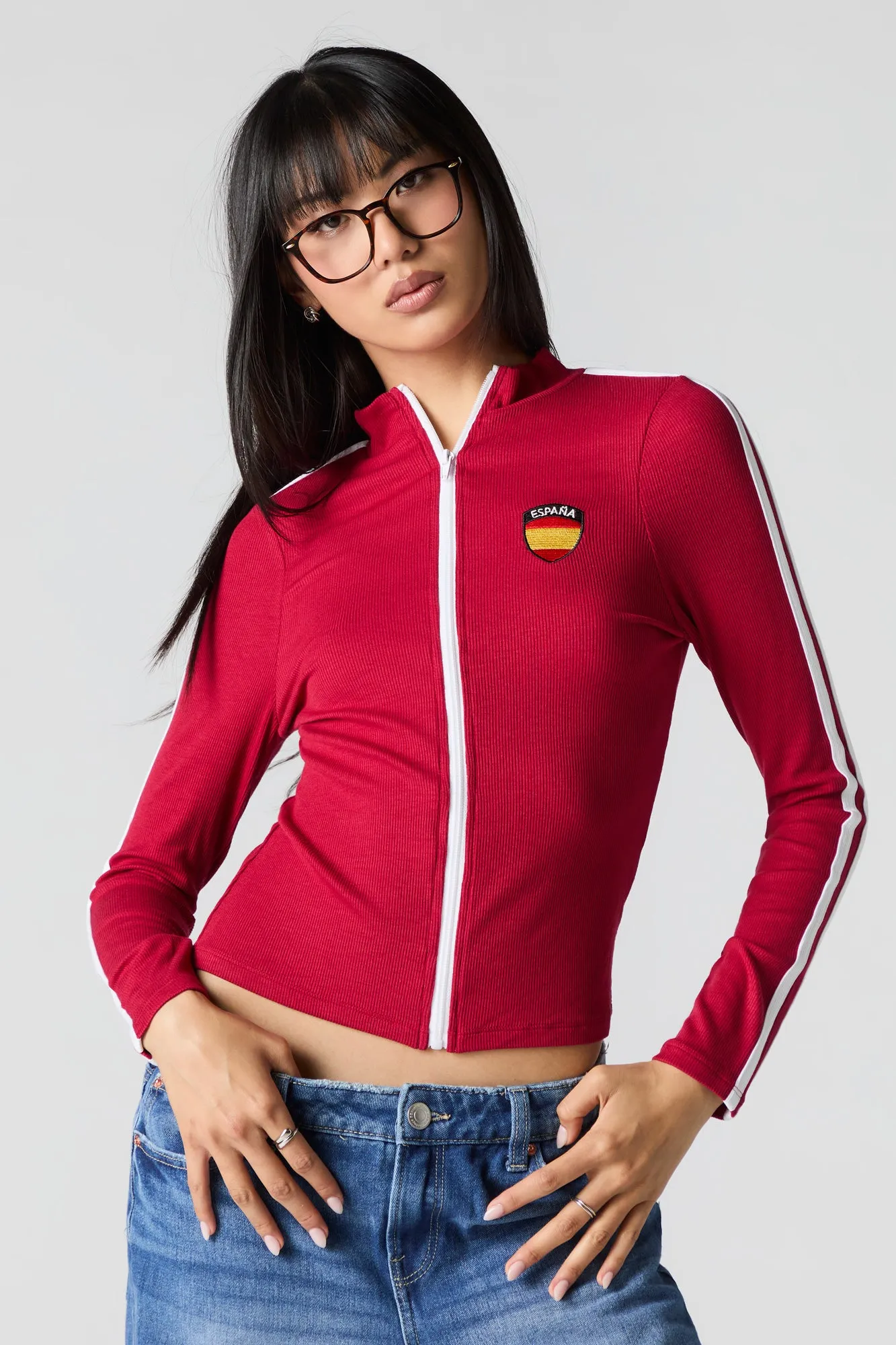 Embroidered Ribbed Zip-Up Sporty Top sold by Charlotte Russe