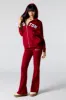 Embroidered Fleece Flare Sweatpant sold by Charlotte Russe