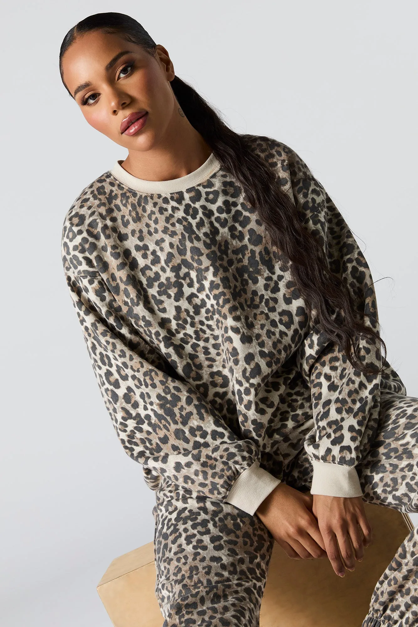 Oversized Cheetah Print Fleece Sweatshirt sold by Charlotte Russe