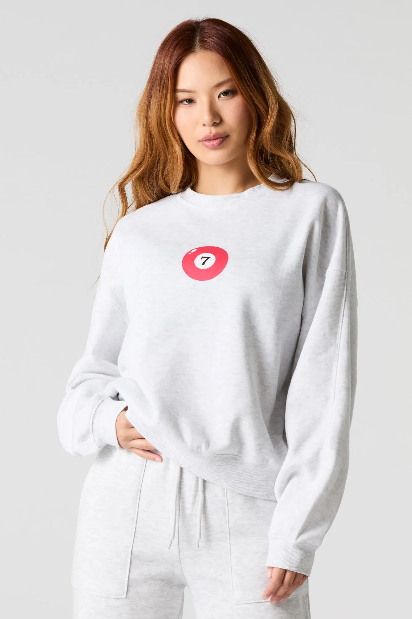 7 Pool Ball Graphic Fleece Sweatshirt sold by Charlotte Russe