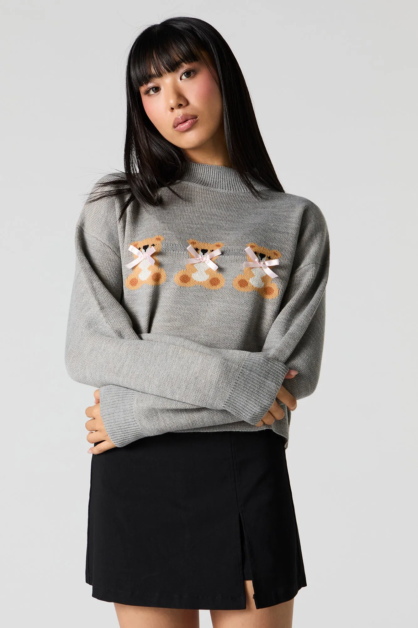 3D Bow Teddy Jacquard Knit Sweater sold by Charlotte Russe