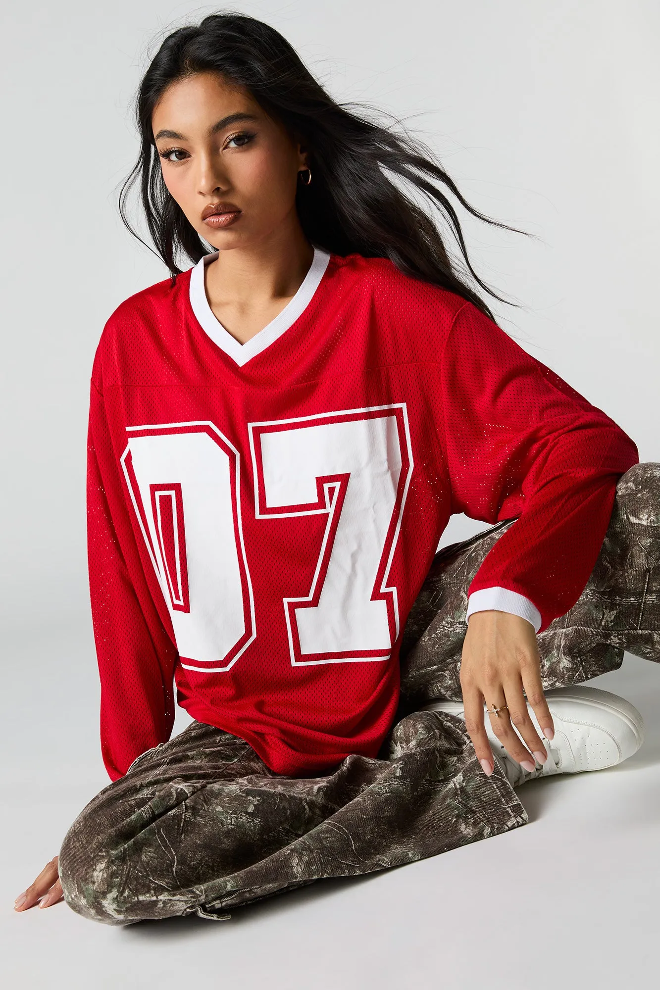 Graphic Mesh Long Sleeve Jersey sold by Charlotte Russe