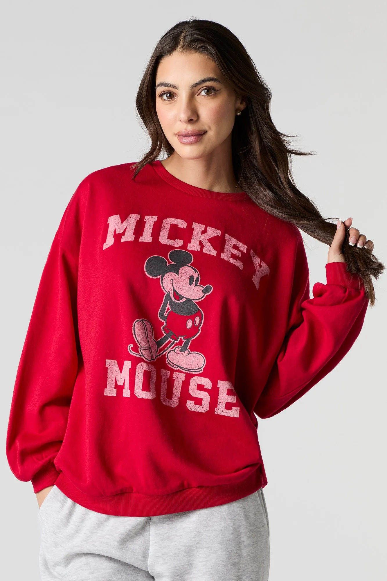 Mickey Mouse Graphic Fleece Sweatshirt sold by Charlotte Russe