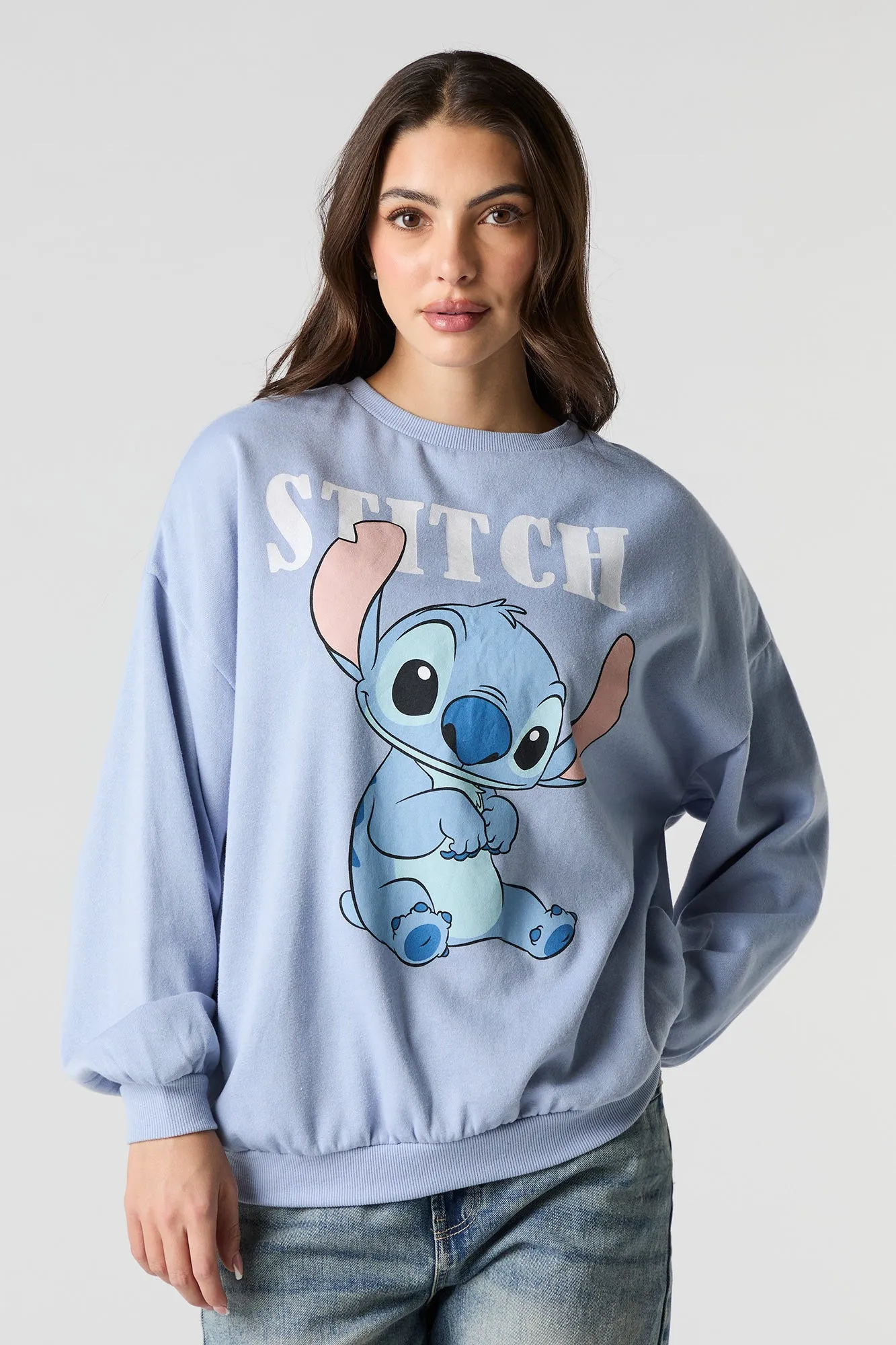 Stitch Graphic Fleece Sweatshirt sold by Charlotte Russe