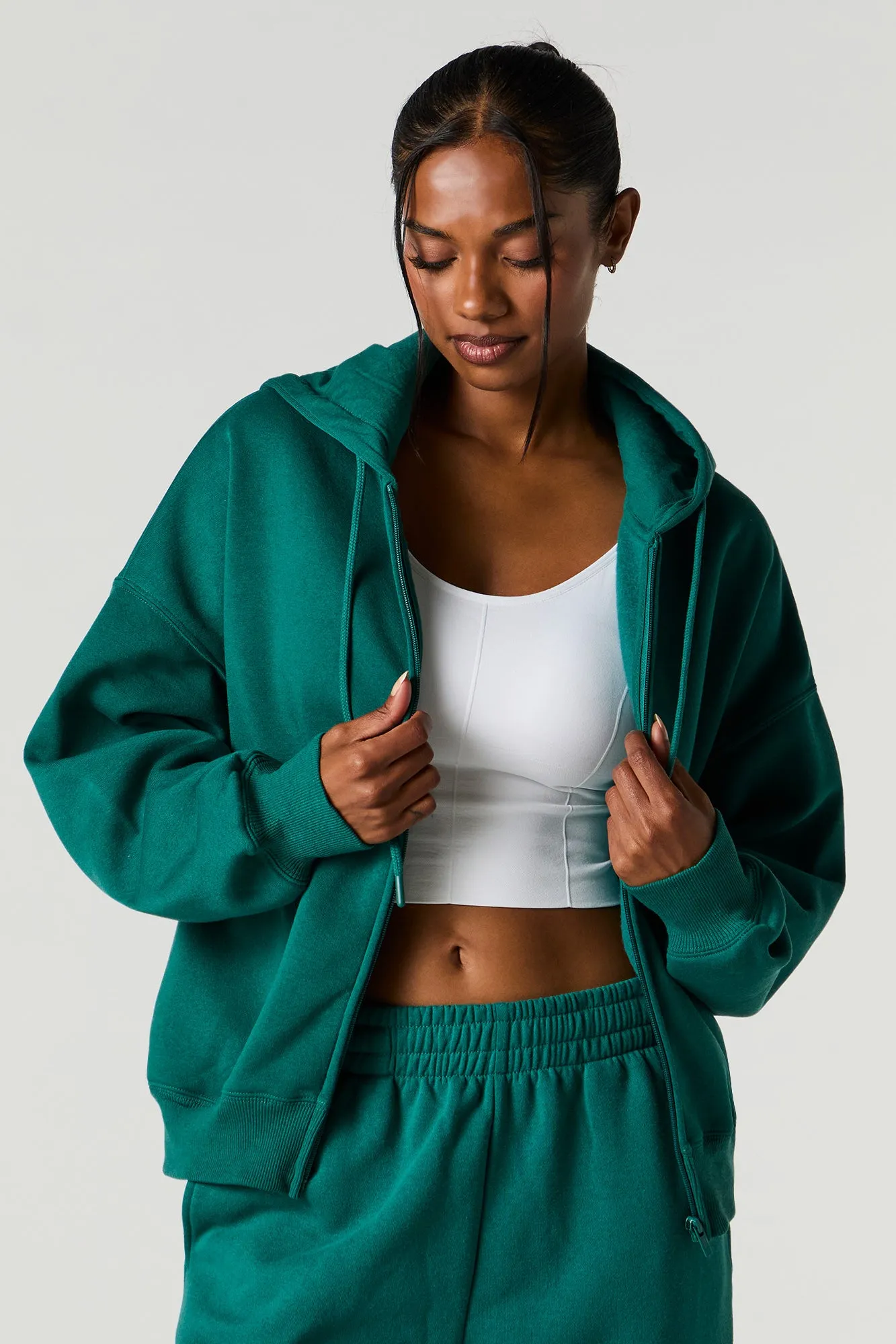 Boxy Zip-Up Fleece Hoodie sold by Charlotte Russe