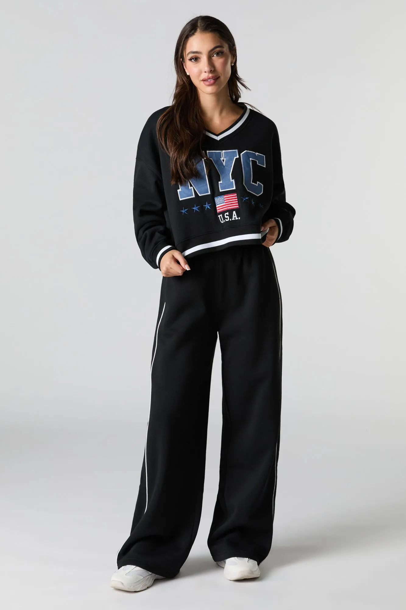 Side Piped Wide Leg Fleece Sweatpant sold by Charlotte Russe