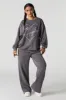 Graphic Fleece Wide Leg Sweatpant sold by Charlotte Russe