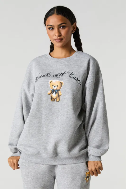 Graphic Fleece Oversized Sweatshirt sold by Charlotte Russe