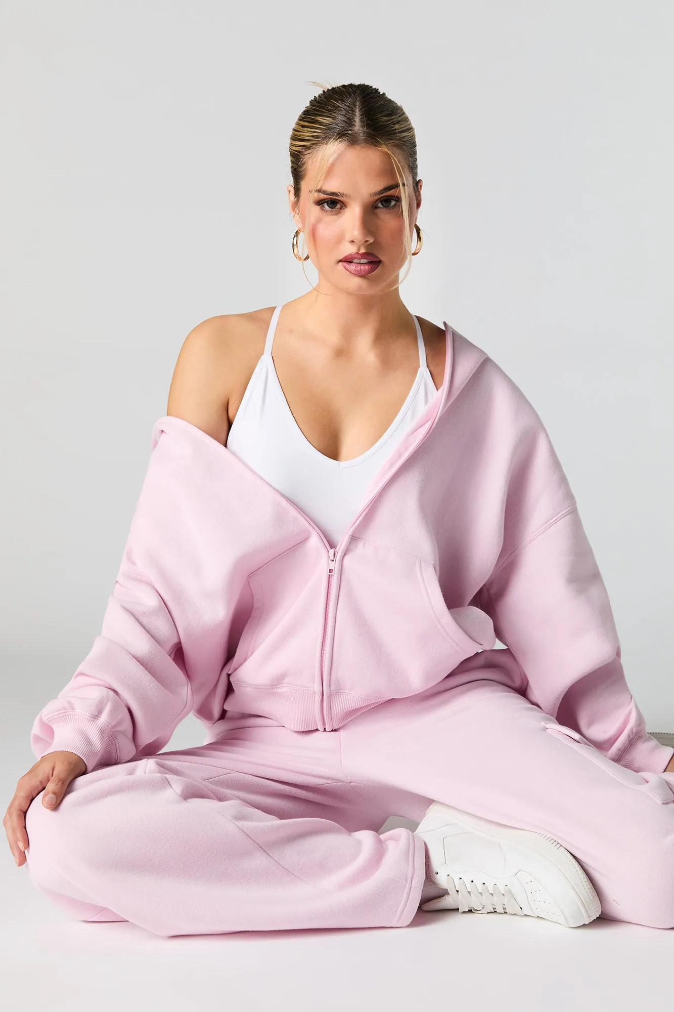 Oversized Solid Fleece Zip-Up Hoodie sold by Charlotte Russe