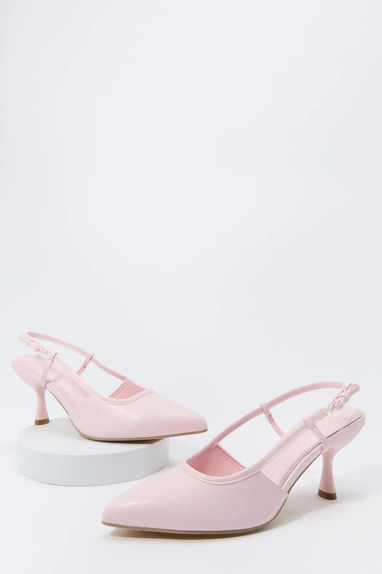 Faux Leather Side Bow Kitten Heel sold by Charlotte Russe